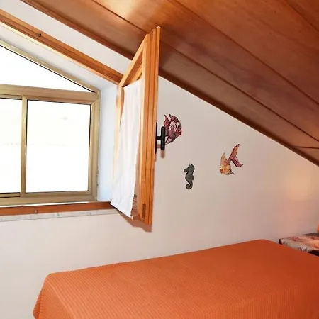 Holiday home Romantic Attic On The Seafront Of *